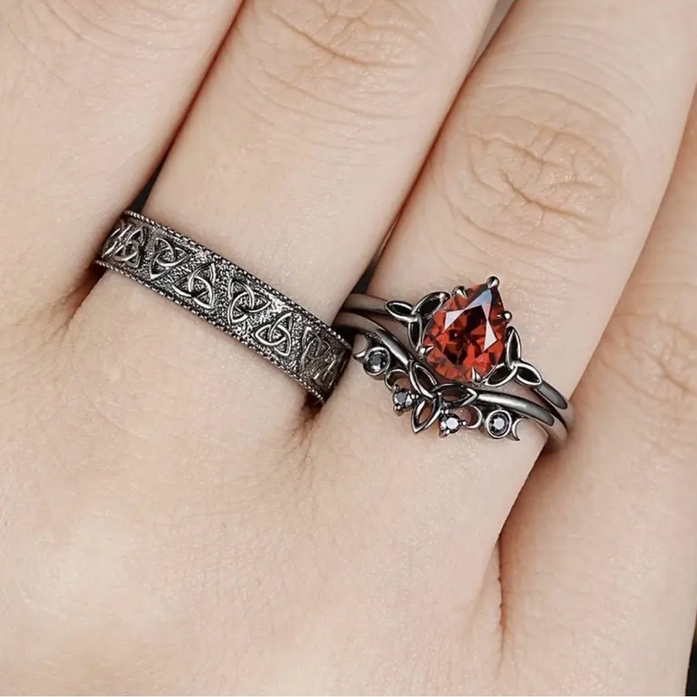 Elegant Silver and Red Gemstone Ring Set.